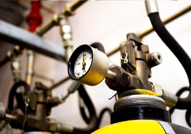 Fire suppression cylinder inspection and testing